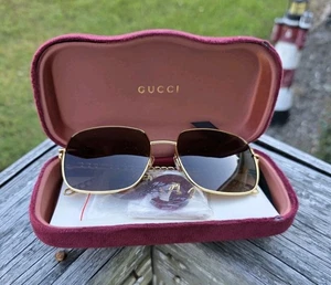 Gucci GG0724s Gold Frame with Bronze lenses & Hanging Charms AC13048471 - Picture 1 of 17