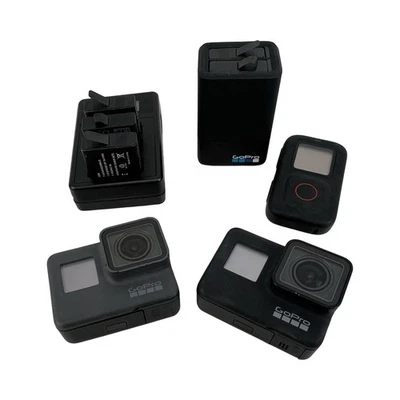 GoPro Hero 7 Black + Hero 5 Bundle with batteries and chargers - Image 1 of 4