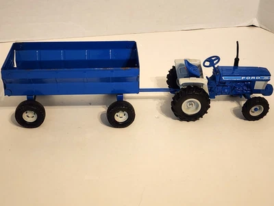 ERTL 1/16 Diecast FORD 1710 Blue Tractor Collector's Edition W/ Ertl Hay Wagon - Image 1 of 4