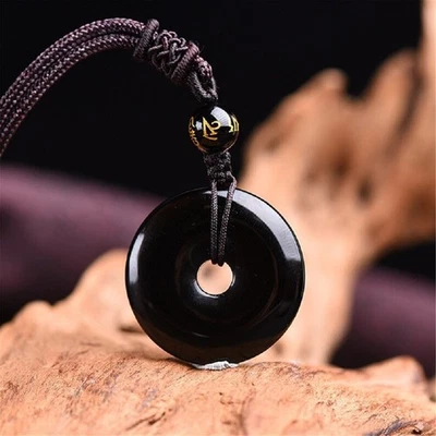 Collar amuleto con dije de piedra de donut de obsidiana natural para fuerza de protección Foto 1 de 4