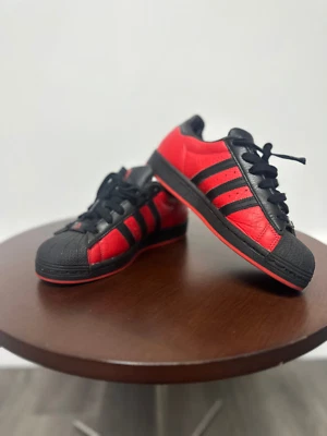 Size 5 - adidas Marvel x Playstation x Superstar Spider-Man: Miles Morales - Image 1 of 4