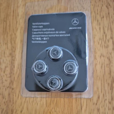 Tapones antipolvo de válvula de neumático originales Mercedes-Benz plateados X4 Foto 1 de 4