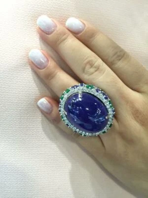 Giant 80.00CT Deep Blue Tanzanite With White CZ,Emerald & Sapphire Accents Ring - Image 1 of 4
