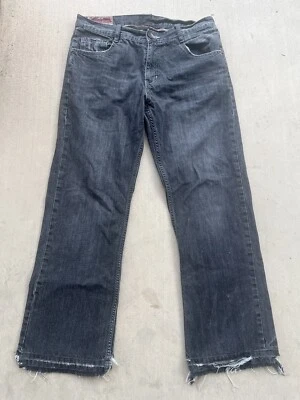 Pantalones de mezclilla para hombre holgados relajados negros vintage grunge desteñidos por el sol dobladillo desgastado corte bootcut Foto 1 de 4