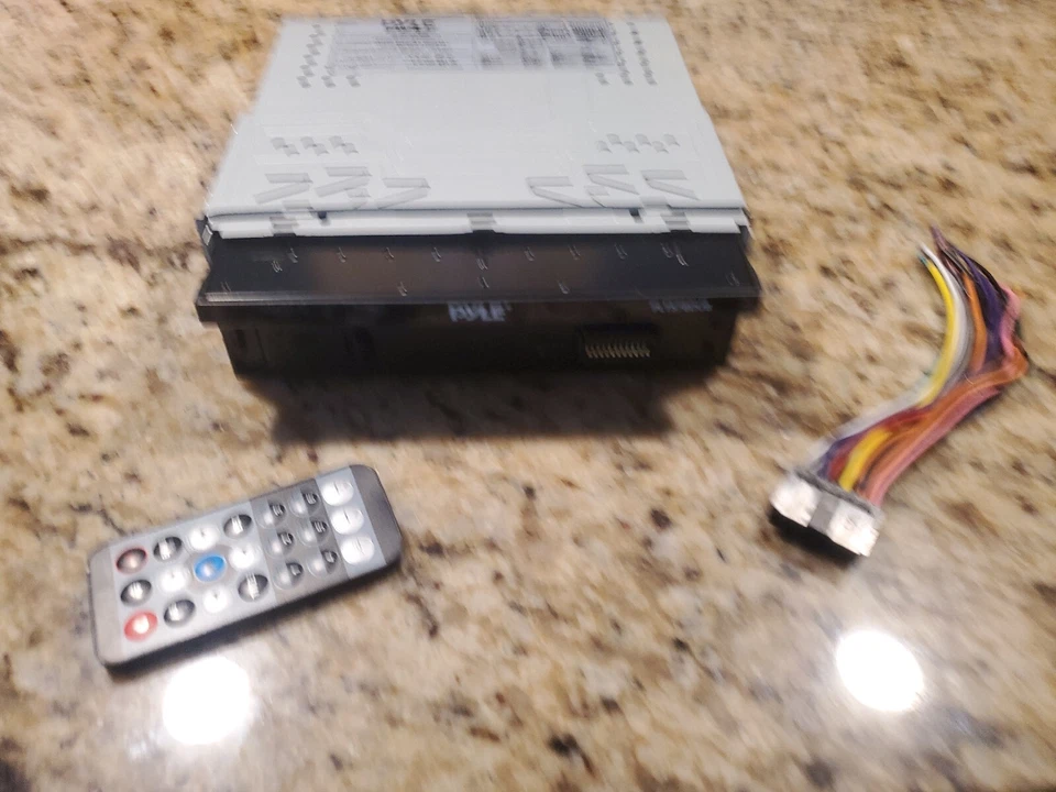 READ - Pyle 7" 1-DIN In-Dash DVD Player w/ Motorized Touchscreen & Bluetooth  - Image 1 of 4