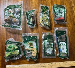 McDonalds The Wild Thornberrys Safari Happy Meal set giocattolo 1-8 nuovo con scatola 1 ha foro - Foto 1 di 3