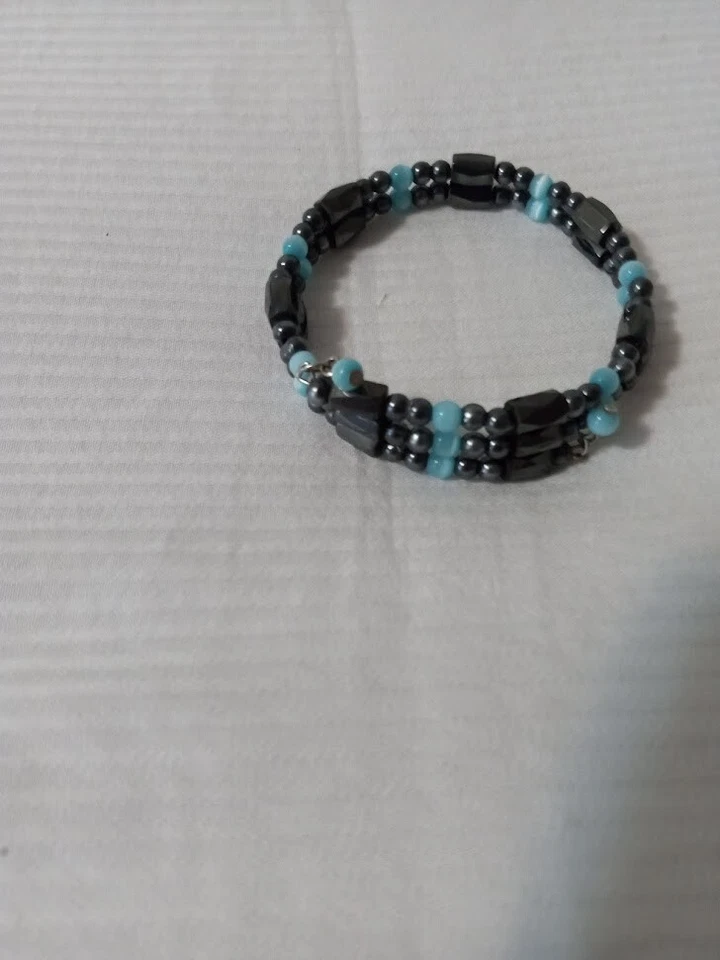 Pulseira elástica de arame preta e turquesa - Imagem 1 de 1