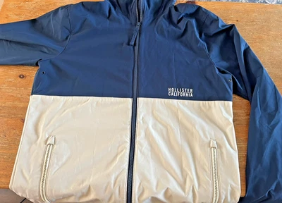 Chaqueta cortavientos Hollister California sudadera con capucha cremallera M azul blanco ligera Foto 1 de 4