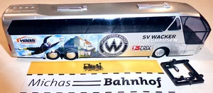 AWM Neoplan 516 SHD L SV WACKER BURGHAUSEN Bus 1:87 H0 US å - Foto 1 di 3