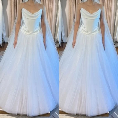 Vestidos de novia sencillos sin tirantes línea A blanco marfil tren barrido vestidos de novia Foto 1 de 4