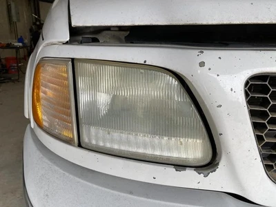 Passenger Headlight Heritage Fits 97-04 FORD F150 PICKUP 1932766 - Image 1 of 4