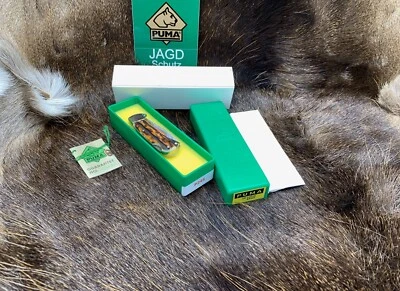 Mini cuchillo carpeta Puma 740 1985 4 estrellas con asas de ciervo como nuevo en caja de fábrica Foto 1 de 4
