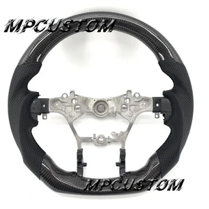 Volante de fibra de carbono real apto para Toyota Hilux Revo Fortuner 2015-2024 - Imagen 1 de 9