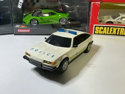 SCALEXTRIC ROVER 3500 POLICIA UK 1/32 con luces y sirena AVANT SLOT FLY NINCO - Imagen 1 de 4