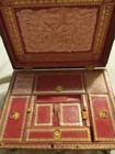 Antique leather on wood Sewing Box dated 1820 with brass feet