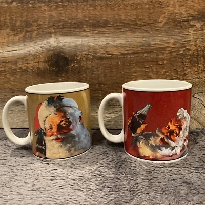 2 Sakura Stoneware 2002 Coca-Cola Christmas Santa Portrait Mugs Coke - Image 1 of 4