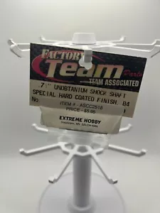 ALBERO AMMORTIZZATORE UNOBTANIUM .71" FACTORY TEAM ASSOCIATO - B4 #6418 - NOS - VINTAGE - Foto 1 di 2