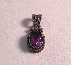Colgante de ley ovalado amatista púrpura facetado Suarti Bali 7,35 gramos - Imagen 1 de 6