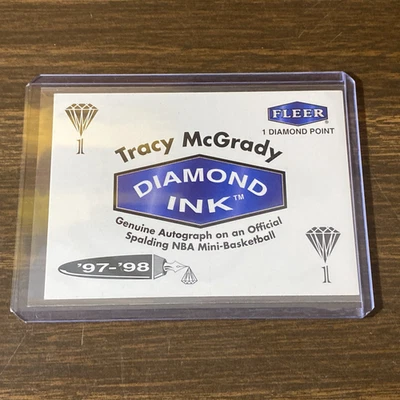 1997-98 Fleer - Diamond Ink Exchange Program Tracy McGrady 1 Point (RC) - Image 1 of 2