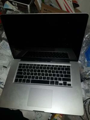 Apple MacBook Pro A1286 15.4" Laptop faulty for parts or repair - Image 1 of 4