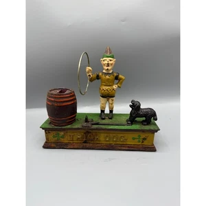 Vintage Trick Dog Cast Iron Mechanical Coin Bank Clown Dog Barrel Jump Hoop - Picture 1 of 6