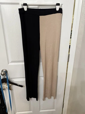 Pantalones BCBG Paris Tejidos Acanalados Color Dividido Negro y Crema Mujer Talla L Calce Elástico Foto 1 de 4