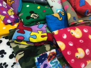 PRINTED POLAR FLEECE fabric REMNANTS 1kg mixed lot craft various colours DESIGNS - Picture 1 of 2