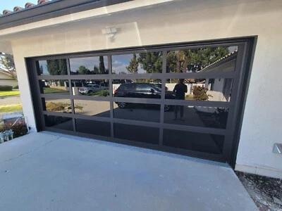 Garage Door | Aluminum And Glass Laminated Black 192" x 84" US MADE MOTOR - Image 1 of 2