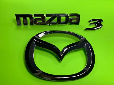 2004-2009 Mazda 3 emblema dianteiro Mazda emblema BN8V51730 2.0L L4 NO FABRICANTE DE EQUIPAMENTO ORIGINAL - Imagem 1 de 3