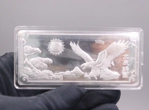 Barra de Plata Pura 999 Invest Eagle Ala Expandida Plata Colección Oblonga/100g - Imagen 1 de 4
