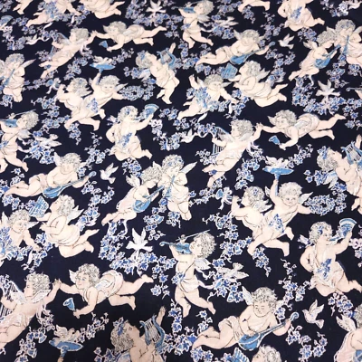 Querubines de Navidad por comprar sin marca azul plateado sobre azul marino Foto 1 de 3