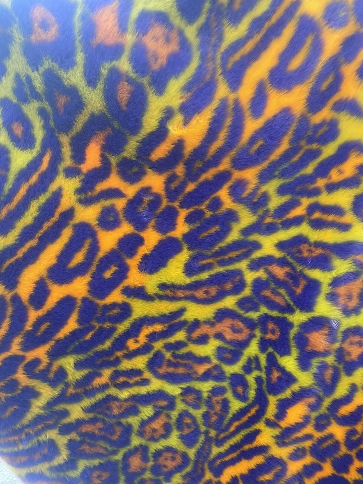 Orange/yellow colored Leopard Spotted shaggy short pile faux fur fabric by  yard - Image 1 of 1