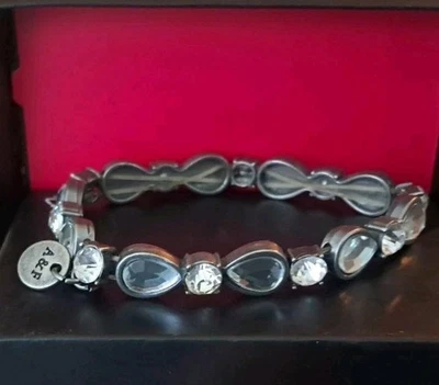 A&F 签名 Abercrombie & Fitch 银色弹性手链蝴蝶结水晶珠 — 第 1/3 张图片