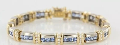 Brazalete de tenis exclusivo de oro blanco y amarillo de 14 quilates de tanzanita de corte redondo de 15 quilates Foto 1 de 4