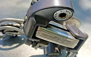 Deragliatore posteriore vintage Suntour V-GT LUXE NERO VGT gabbia lunga bullone su lega anni 70 - Foto 1 di 6