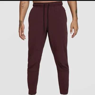 NOVA Calça Nike Unlimited Dri-Fit Perna Cônica Versátil Masculina Grande Alta FB7546-652 - Imagem 1 de 4