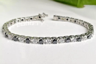Brazalete de tenis redondo de diamantes blancos y negros de 7 quilates creado en laboratorio enchapado en oro blanco de 14 k Foto 1 de 4