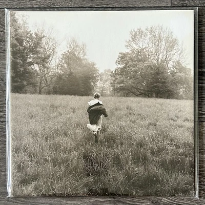 Taylor Swift Folklore LP Running Like Water Limited Edition Silver Vinyl Record - Image 1 of 3