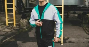 New Balance® NB Athletics Ripstop Windbreaker | S | Teal | $95 - Picture 1 of 3