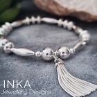 Inka Sterling Silver Chunky Oval Bead Stacking Bracelet With Large Tassel Charm