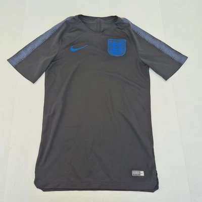 Camiseta de fútbol Inglaterra pequeña negra para hombre 100 % poliéster entrenamiento Nike Foto 1 de 4