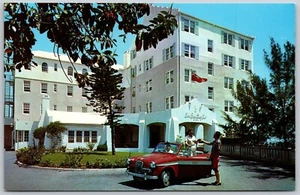 Postcard Bermuda Paget Entrance to Elbow Beach Surf Club Red Taxi Convertible - Picture 1 of 2