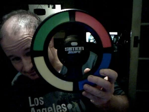 SIMON SAYS SIMON SWIPE ELECTRONIC GAME BIRTHDAY CHRISTMAS KIDS ADULTS CHARITY - Picture 1 of 2