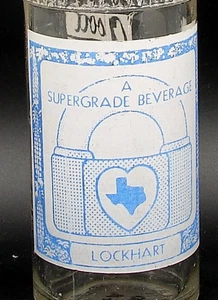 Lockhart; Coca-Cola Btg. Co.; Lockhart, TX.; 2-color ACL soda pop bottle - Picture 1 of 3