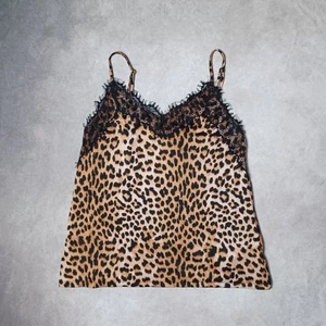 Tunica canotta donna slip top cami stampa leopardata piccola marrone pizzo orlo floreale scollo a V - Foto 1 di 5