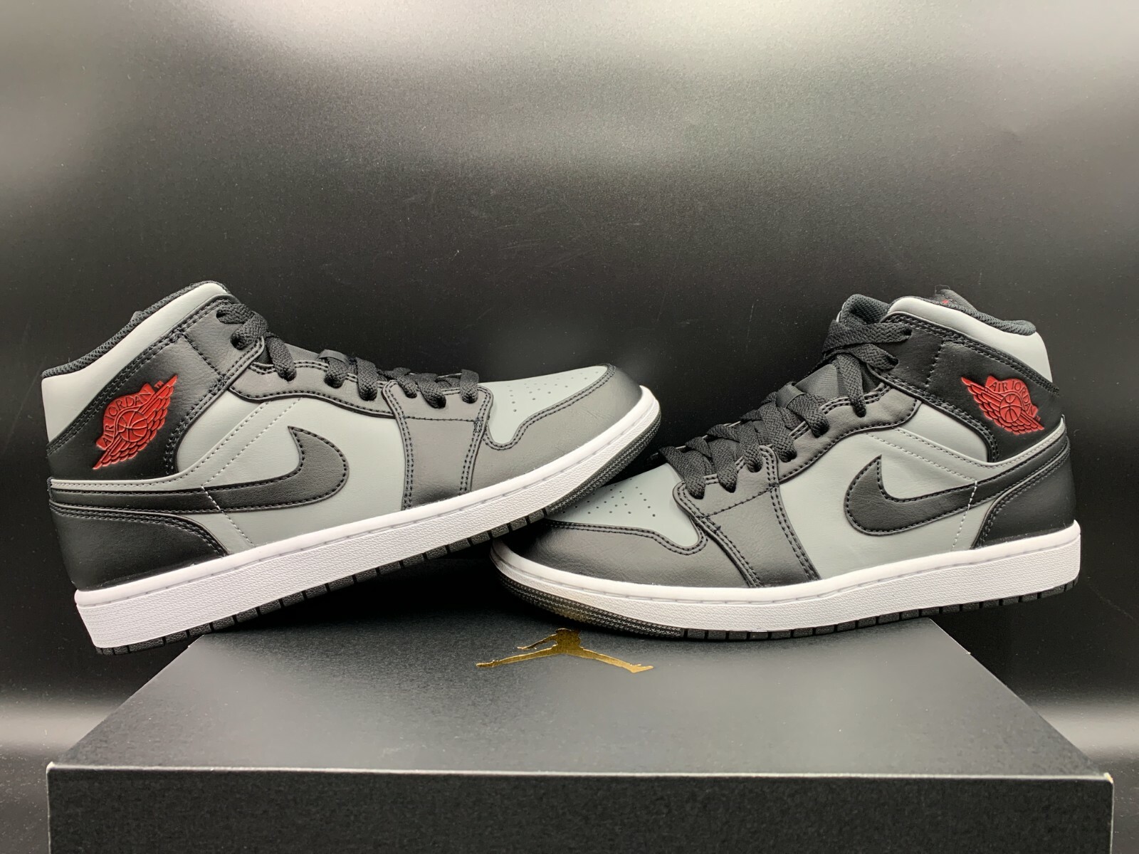 jordan 1 mid black gym red wolf grey