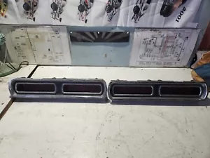 PAIR OF 1966 PONTIAC CATALINA TAIL LIGHT BEZELS LENSES & BRACKETS - Picture 1 of 10