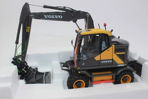 AT Collection 3200100 Volvo EWR 150 E Mobile Excavator 1:32 Nokian Tires NEW OVP - Picture 1 of 10