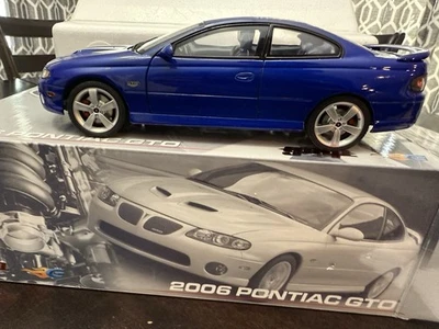 Pontiac GTO Impulse 2006 modelo IBM azul GMP Acme escala 1:18 Foto 1 de 4