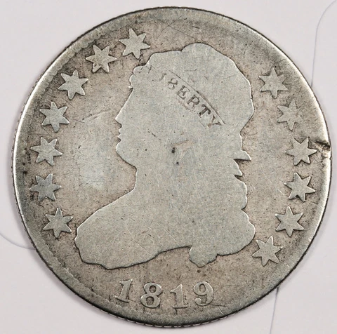 1819 Bust Quarter.  CUD on Reverse over "C" In "America".  Good.  178959 Cover